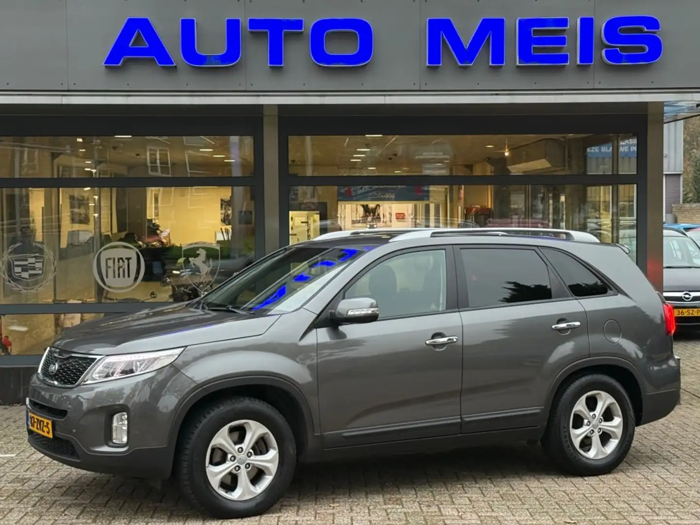 Kia Sorento 2.4 GDI Plus Pack Automaat Navi Clima Cruise Camer Gri - 1