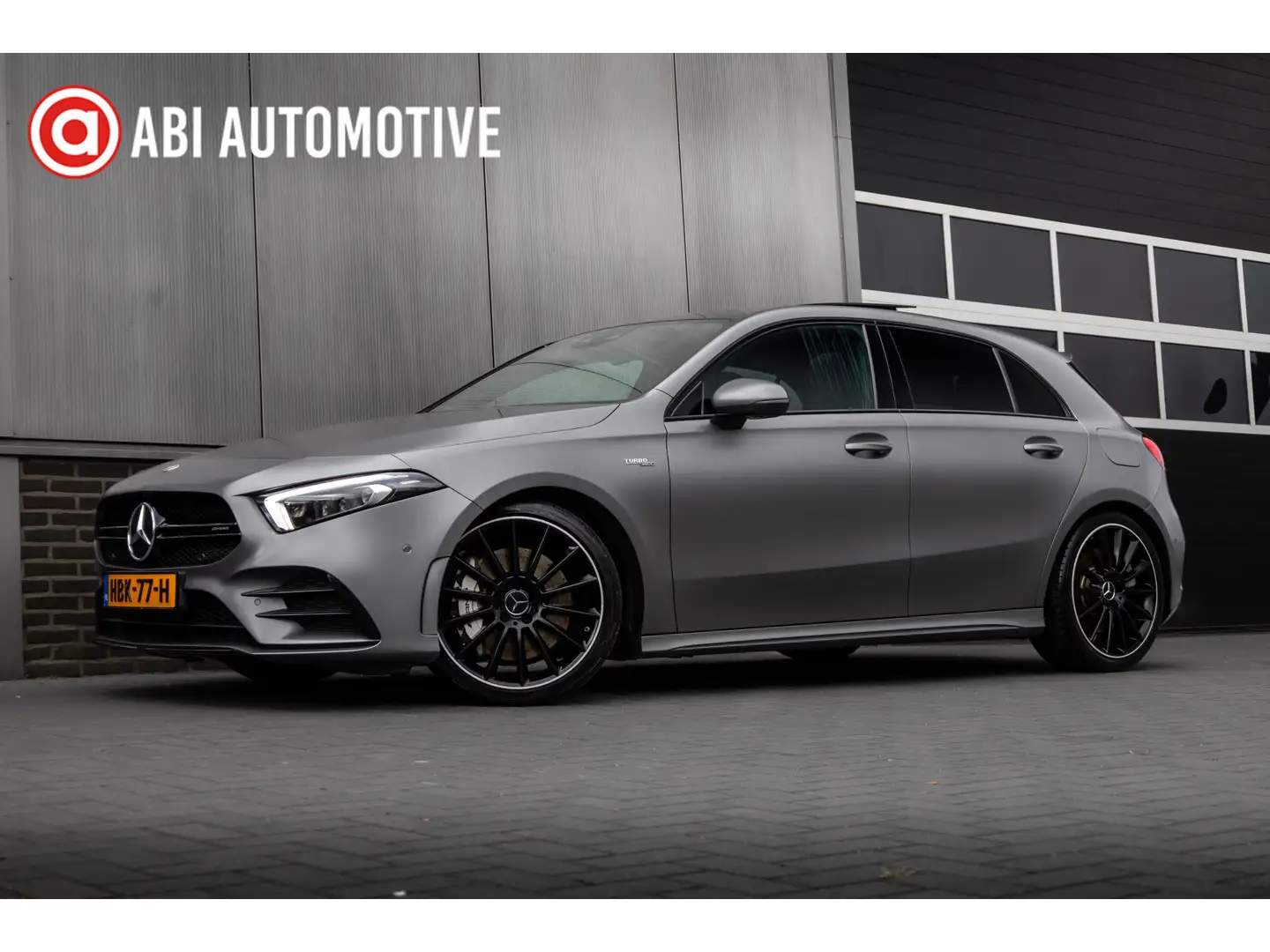 Mercedes-Benz A 35 AMG 4MATIC 306 pk Premium Plus AMG-Pakket / Mat-Grijs/ Grijs - 1