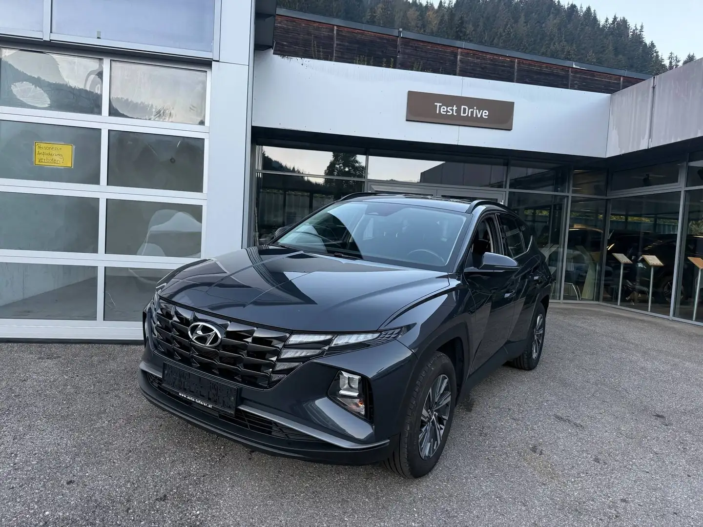 Hyundai TUCSON SmartLine Hybrid Benzin 4x4 Aut. Grau - 1