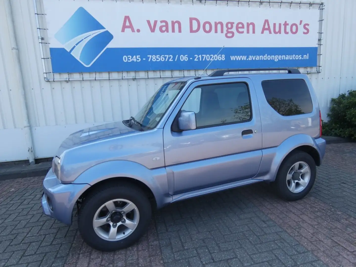 Suzuki Jimny 1.3 EXCLUSIVE 4WD Automaat,Airco,Trhaak,APK 30-4-2 Blauw - 1