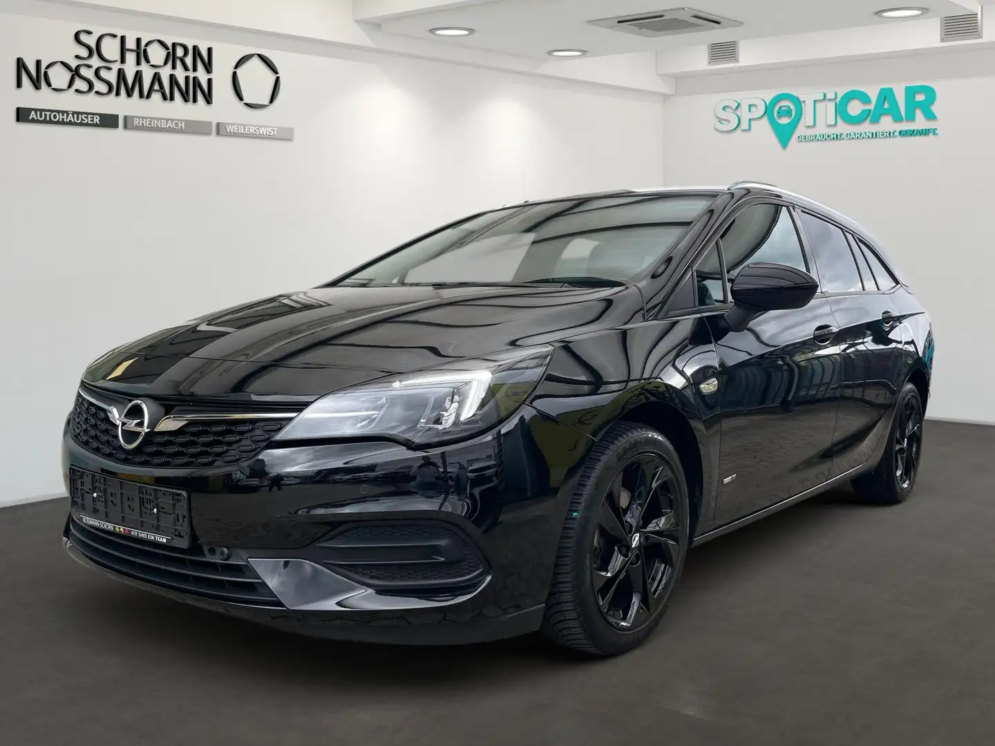 Opel Astra ASTRA SPORTS TOURER 1.2 TURBO WINTERPAKET+PDC+CARP Zwart - 1