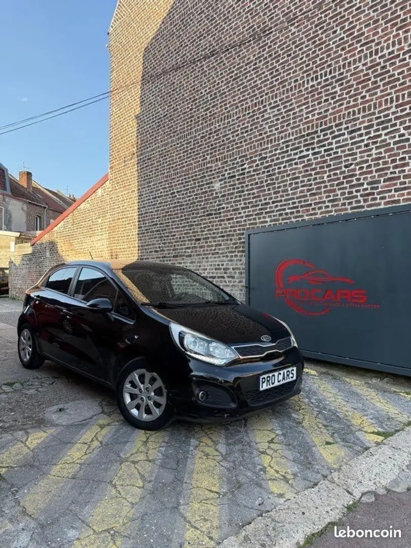Kia Rio Schwarz - 1