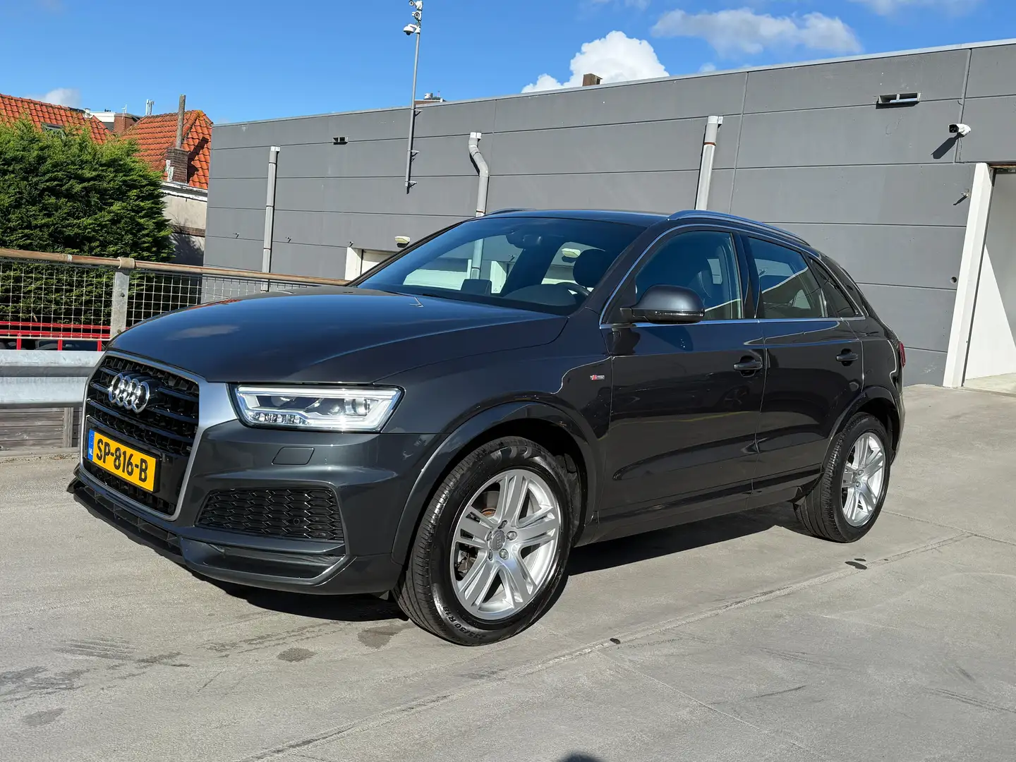 Audi Q3 1.4 150PK S-Tronic TFSI CoD Sport Advance Sport | Grijs - 1