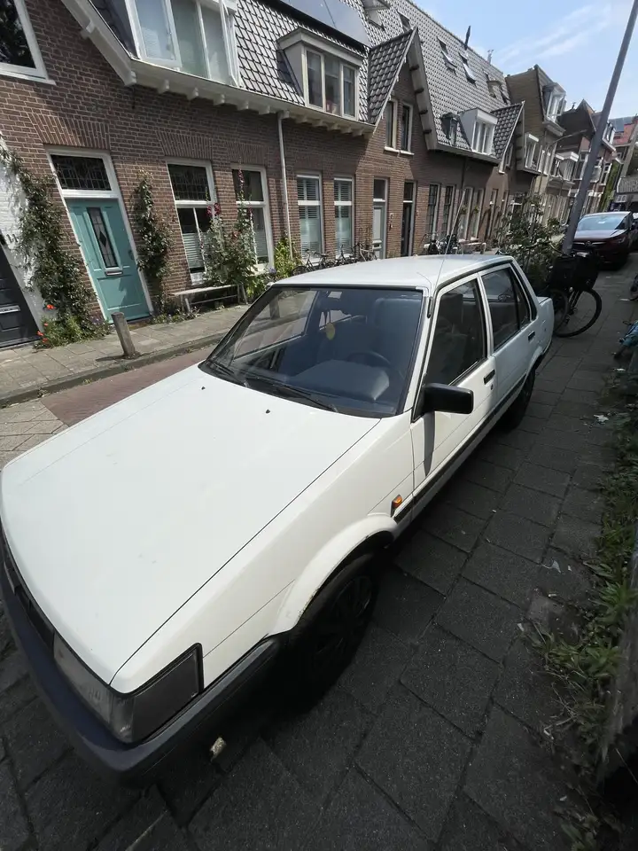 Toyota Corolla 12 V DX, foto 3