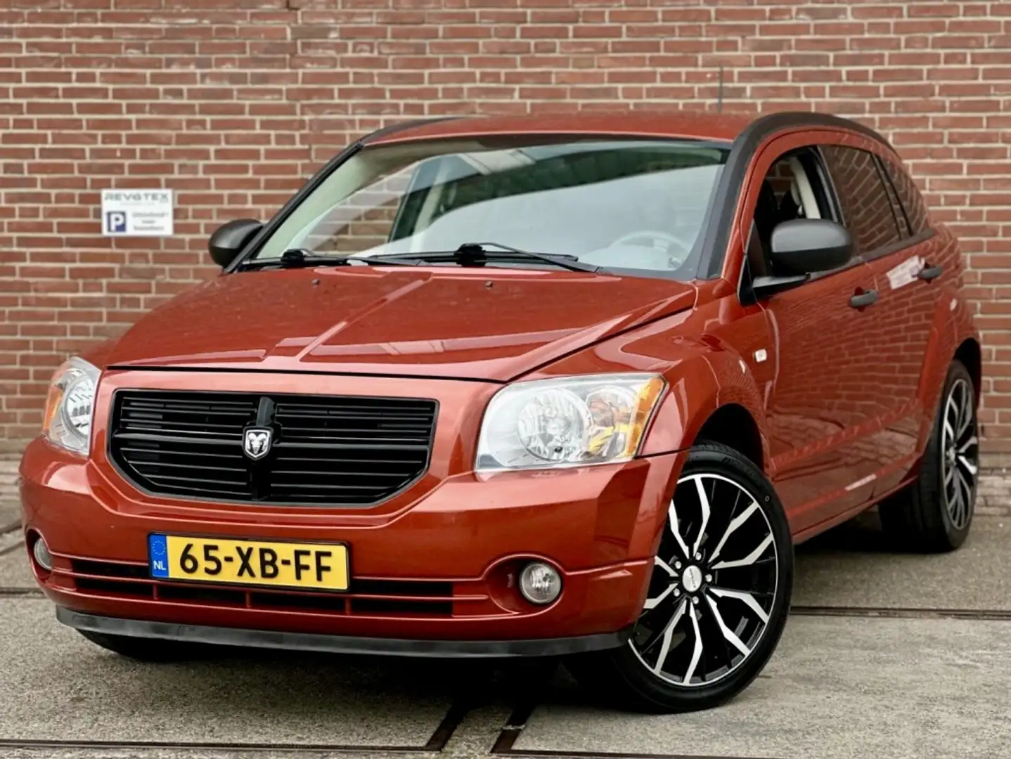 Dodge Caliber 1.8 SE |Airco |CarPlay |Nieuwe APK |Sport Naranja - 1