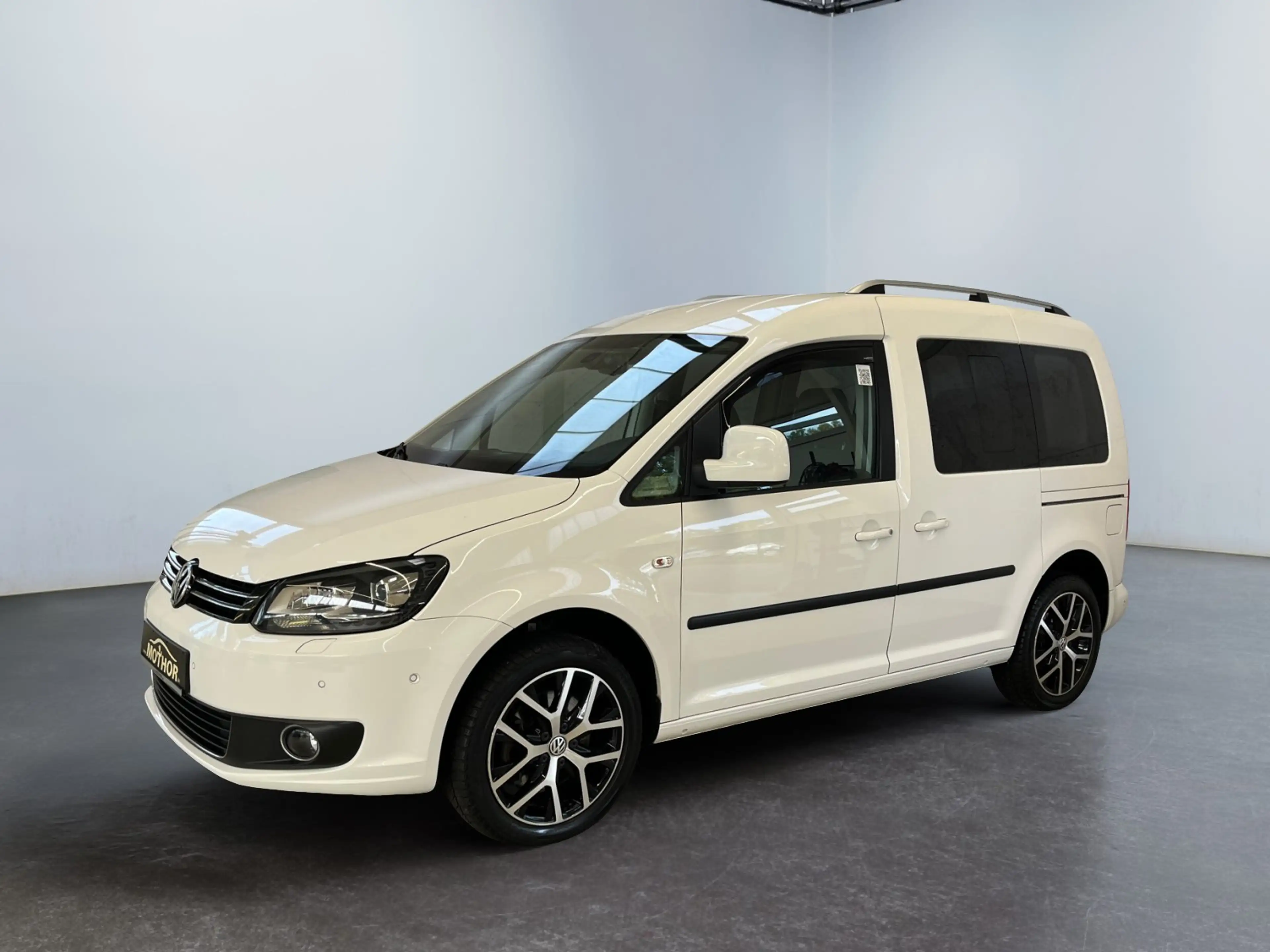 Volkswagen Caddy Kombi Highline 2.0 TDI DSG 7Sitzer BiXenon — photo 2