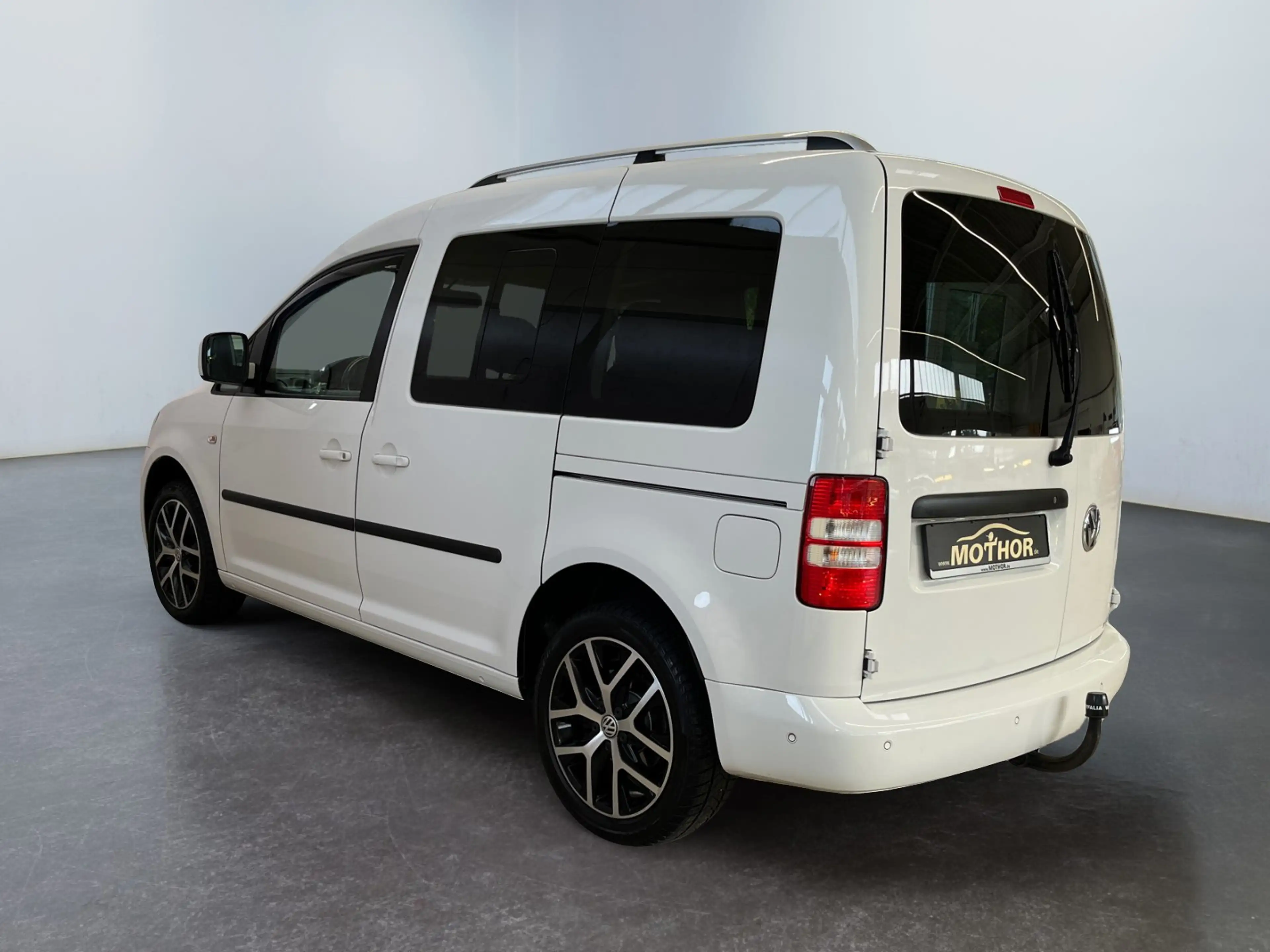 Volkswagen Caddy Kombi Highline 2.0 TDI DSG 7Sitzer BiXenon — photo 4