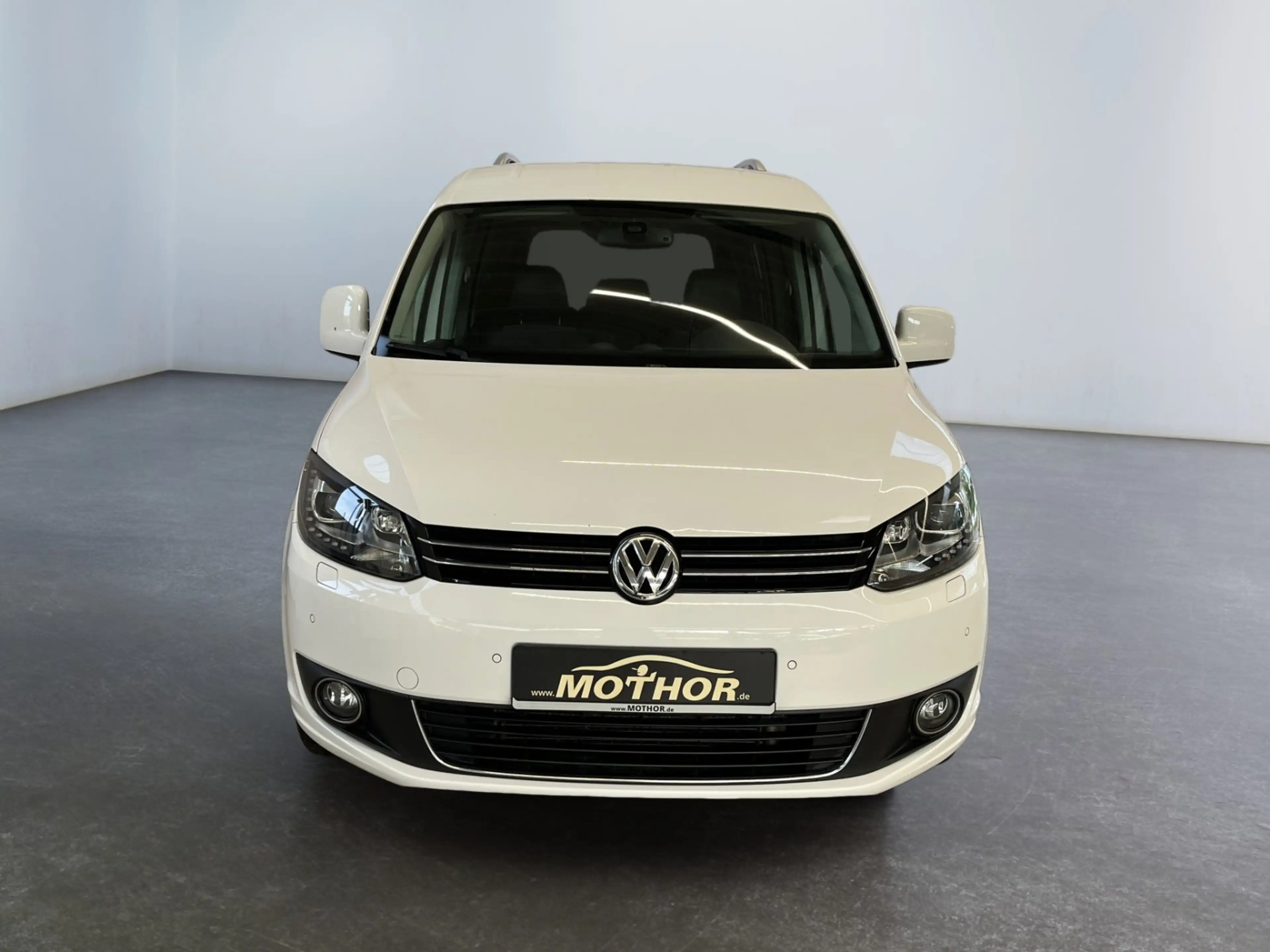 Volkswagen Caddy Kombi Highline 2.0 TDI DSG 7Sitzer BiXenon — photo 6