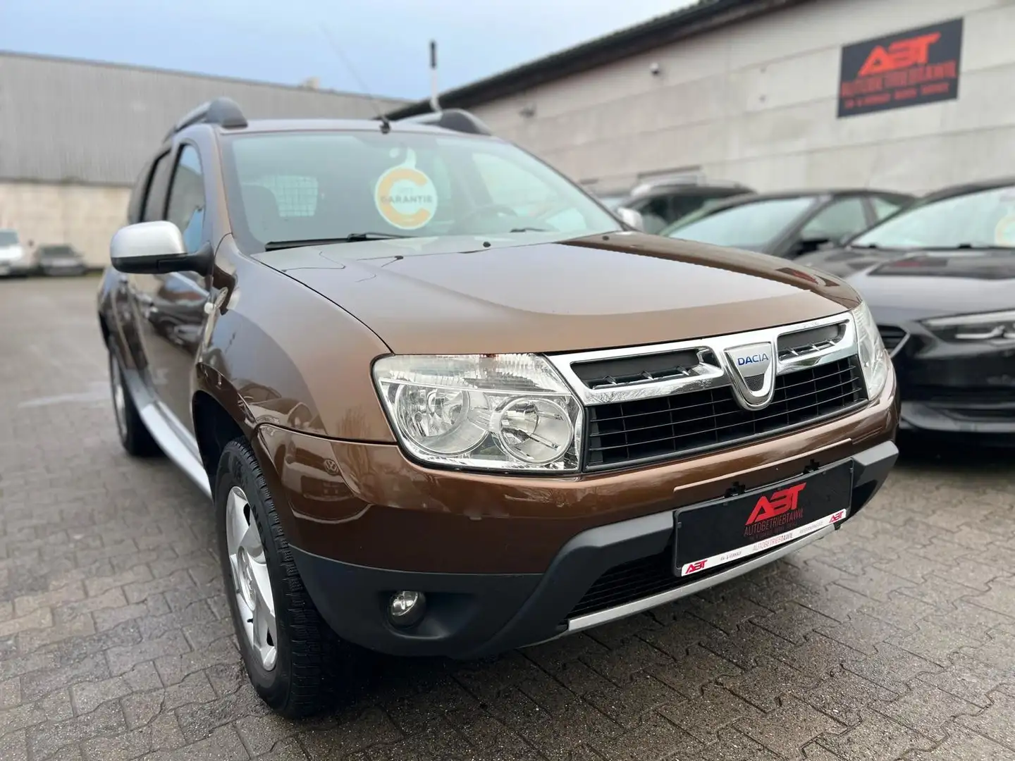 Dacia Duster 1.6, TÜV NEU, Klima, PDC, AHK, Leder Braun - 1