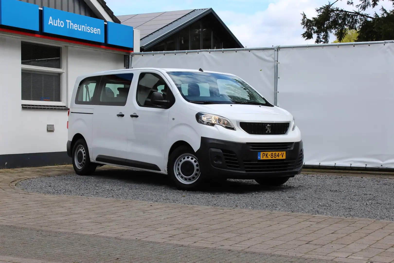 Peugeot Expert 1.6 BlueHDi 115pk Business 9 persoons | Traveller Wit - 1