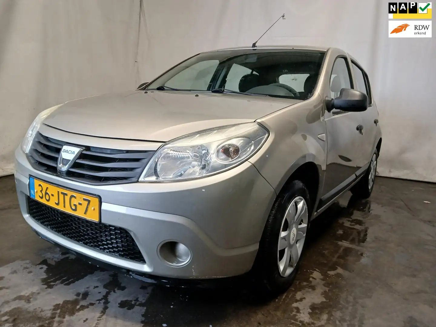 Dacia Sandero 1.2 Ambiance - Airco - Schade Grijs - 1