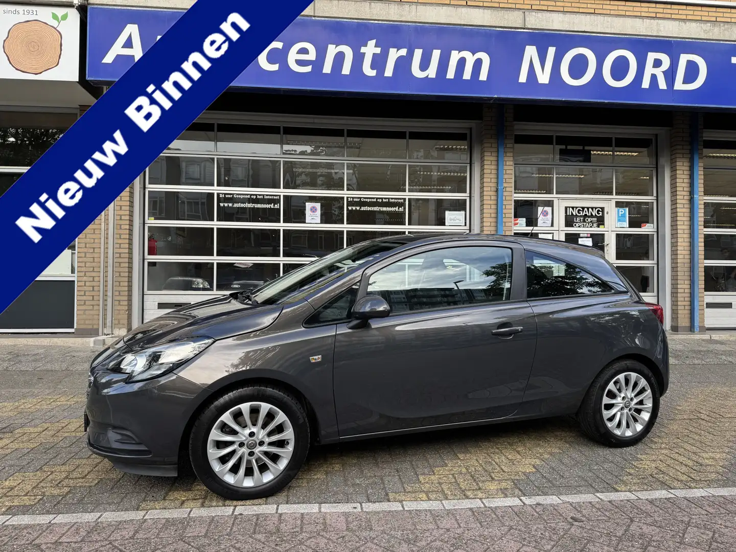 Opel Corsa 1.0 Turbo Business+ 82900KM! NAP | Airco | Cruise Grijs - 1