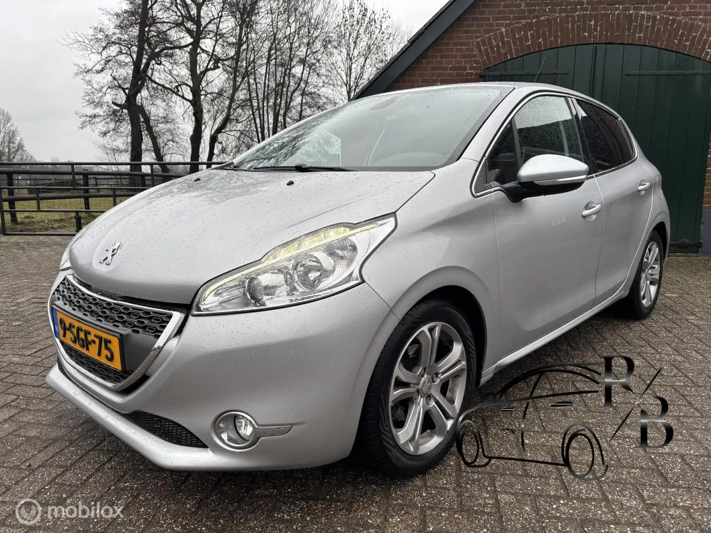 Peugeot 208 1.2 VTi Allure NAVI AIRCO CRUISE NL-auto 2 EIG Grau - 1