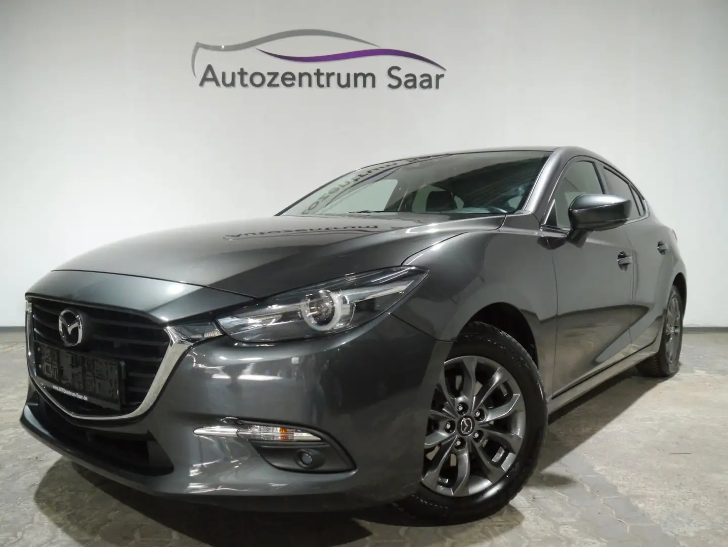 Mazda 3 Exclusive-Line Navi LED SH Tempomat DAB PDC BT Grijs - 1