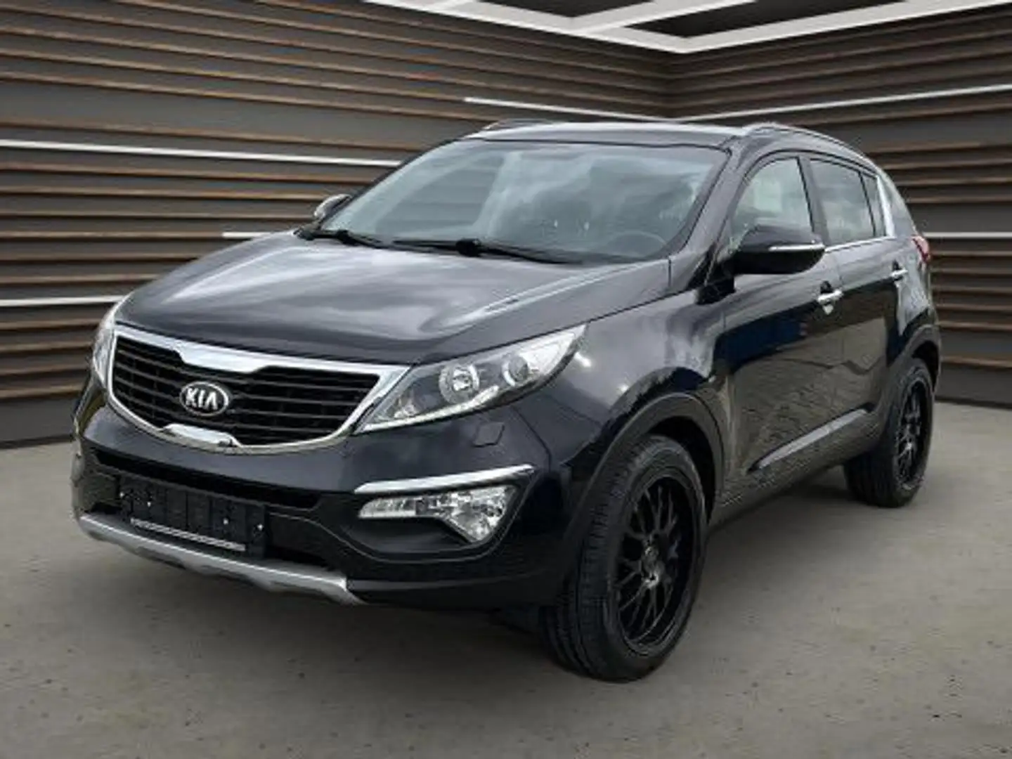 Kia Sportage 2.0 CVVT 2WD Spirit Zwart - 1