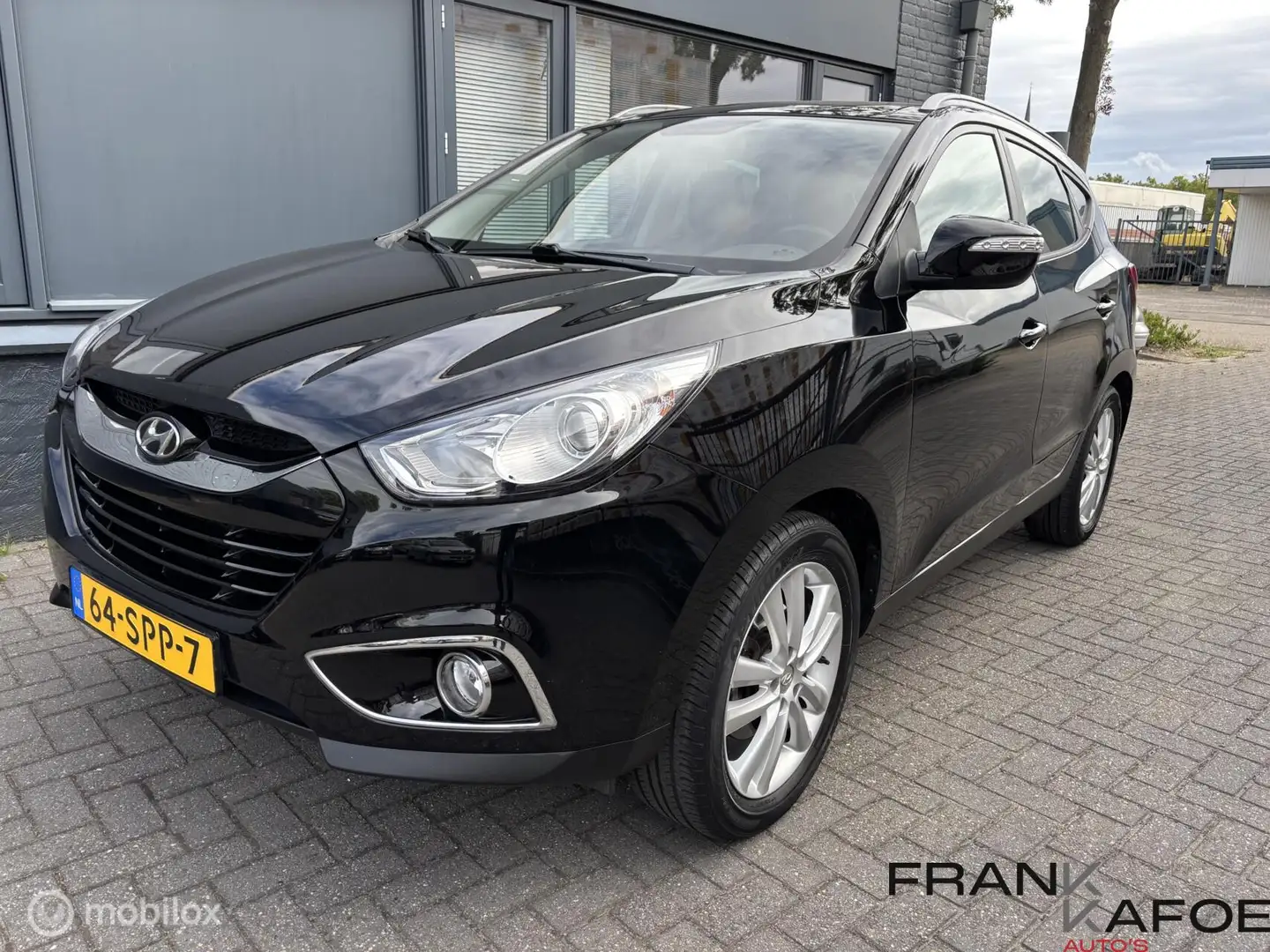 Hyundai iX35 2.0i i-Catcher Automaat NAVI ECC Cruise PANO 18" P Noir - 1