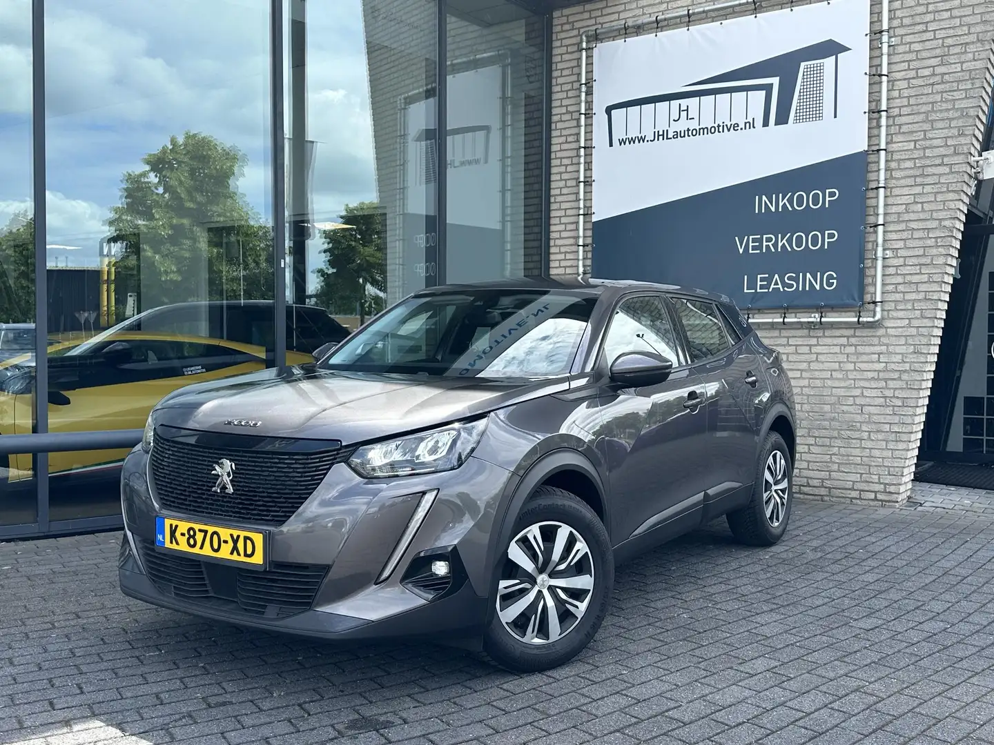 Peugeot 2008 1.2 PureTech*ECC*TREKHAAK*NAVI*CRUISE*TEL*CAMERA* Gris - 1