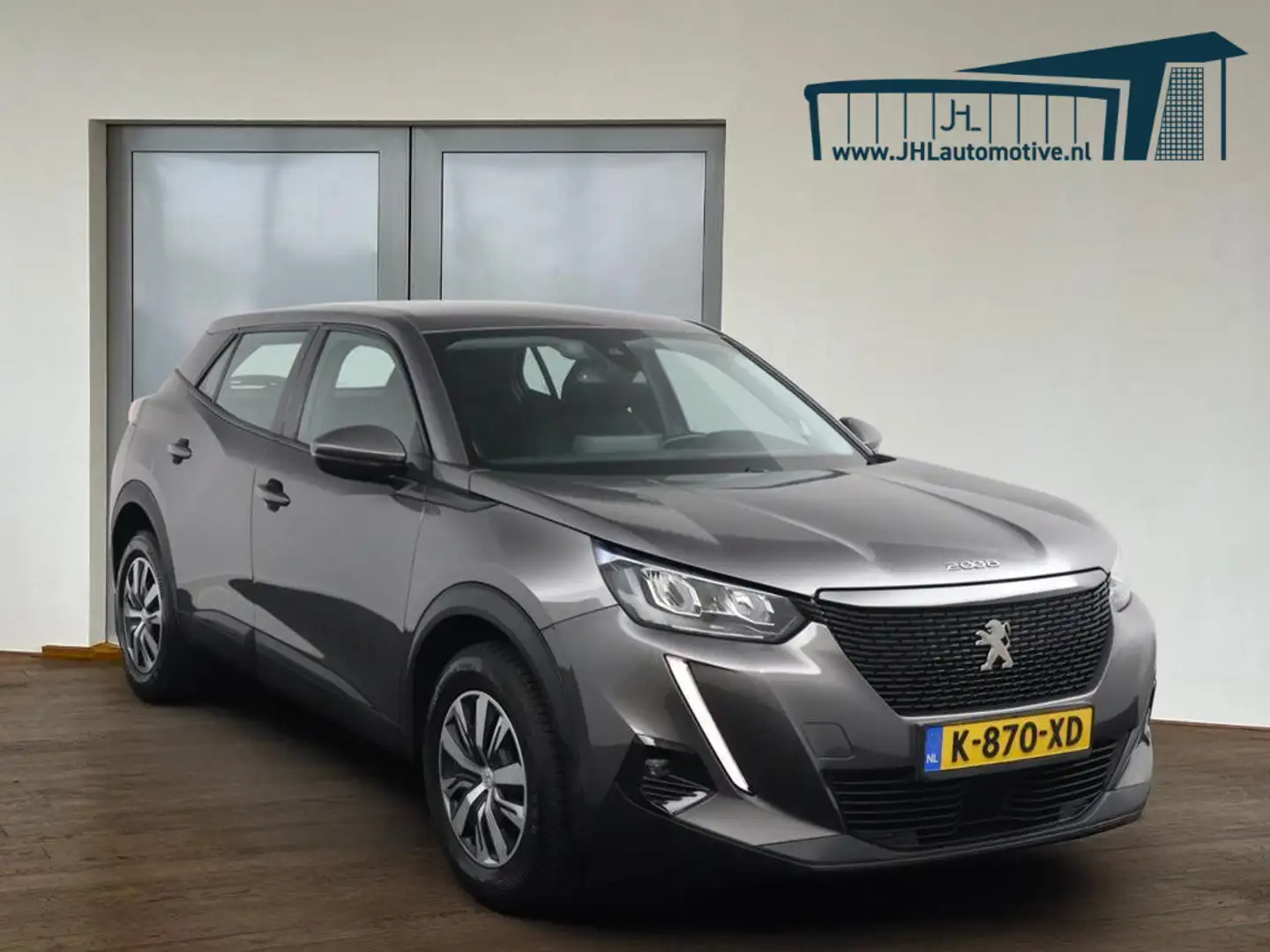 Peugeot 2008 1.2 PureTech*ECC*TREKHAAK*NAVI*CRUISE*TEL*CAMERA* Grigio - 1