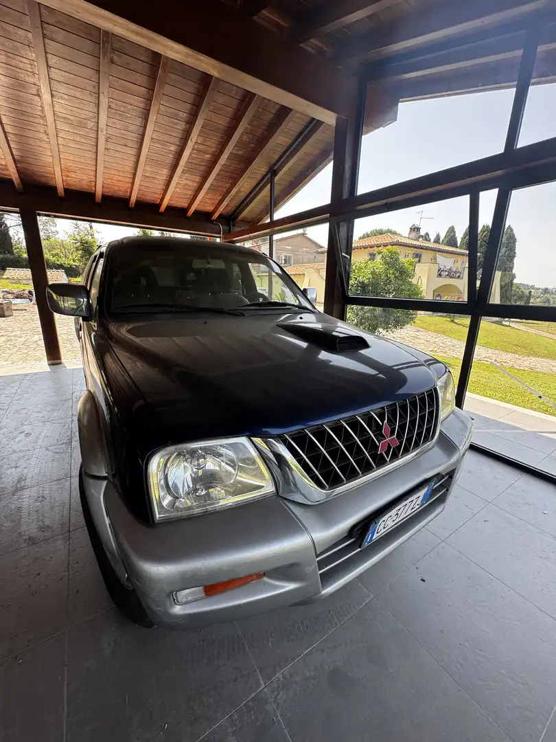 Mitsubishi L200 d.cab 2.5 tdi GL 4wd 115cv - 1