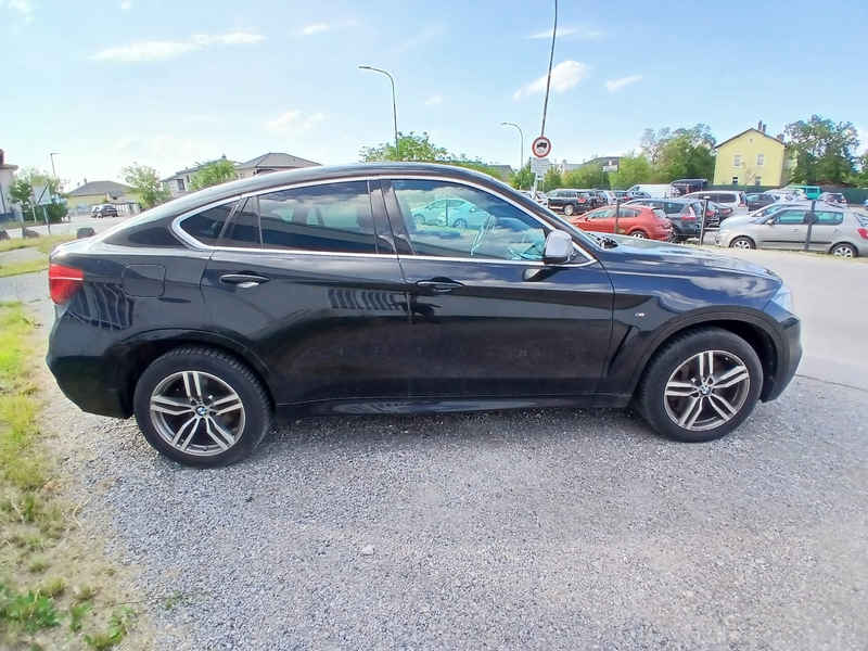 BMW X6 M50d Sport Activity Coupé Aut. *Lagerschaden* — photo 4