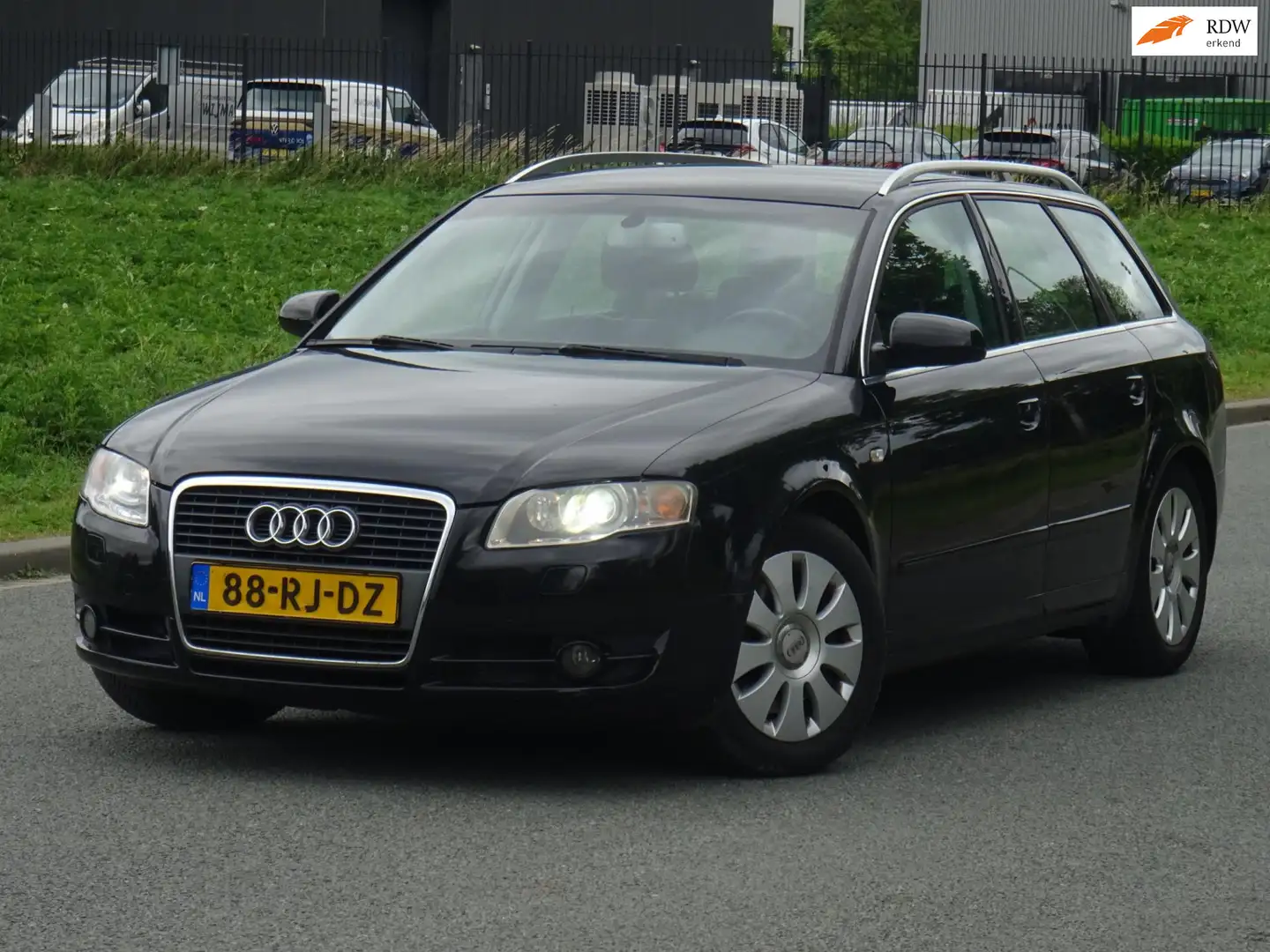 Audi A4 Avant 2.0 TFSI Pro Line NAP/LEER/CLIMA/PDC/CRUISE Zwart - 1