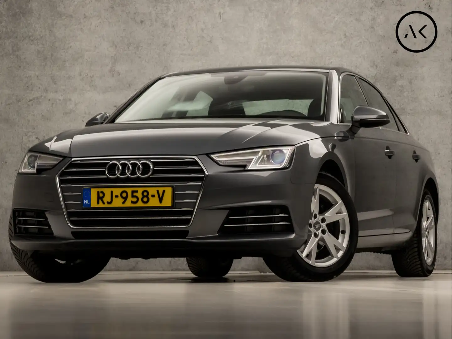 Audi A4 Limousine 2.0 TFSI Ultra Sport 191Pk Automaat (VIR Grijs - 1
