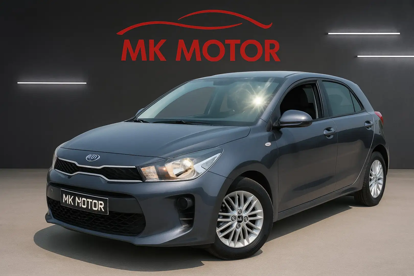 Kia Rio 🟢1.2 ESSENCE 84 CV - GPS - CAMERA - FULL CARNET Grau - 1