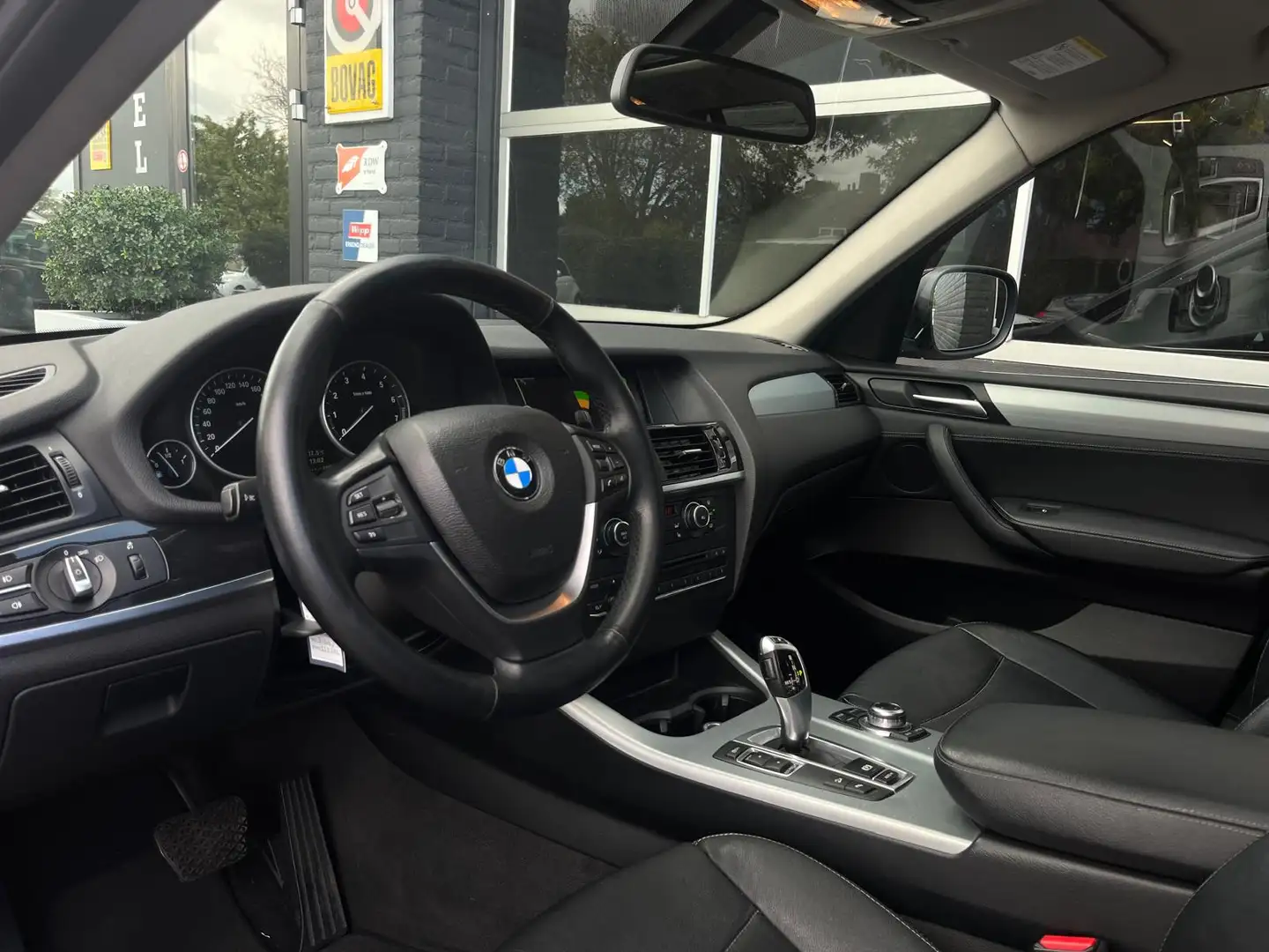 BMW X3 xDrive20i High Executive, Automaat, Panoramadak, C Noir - 2