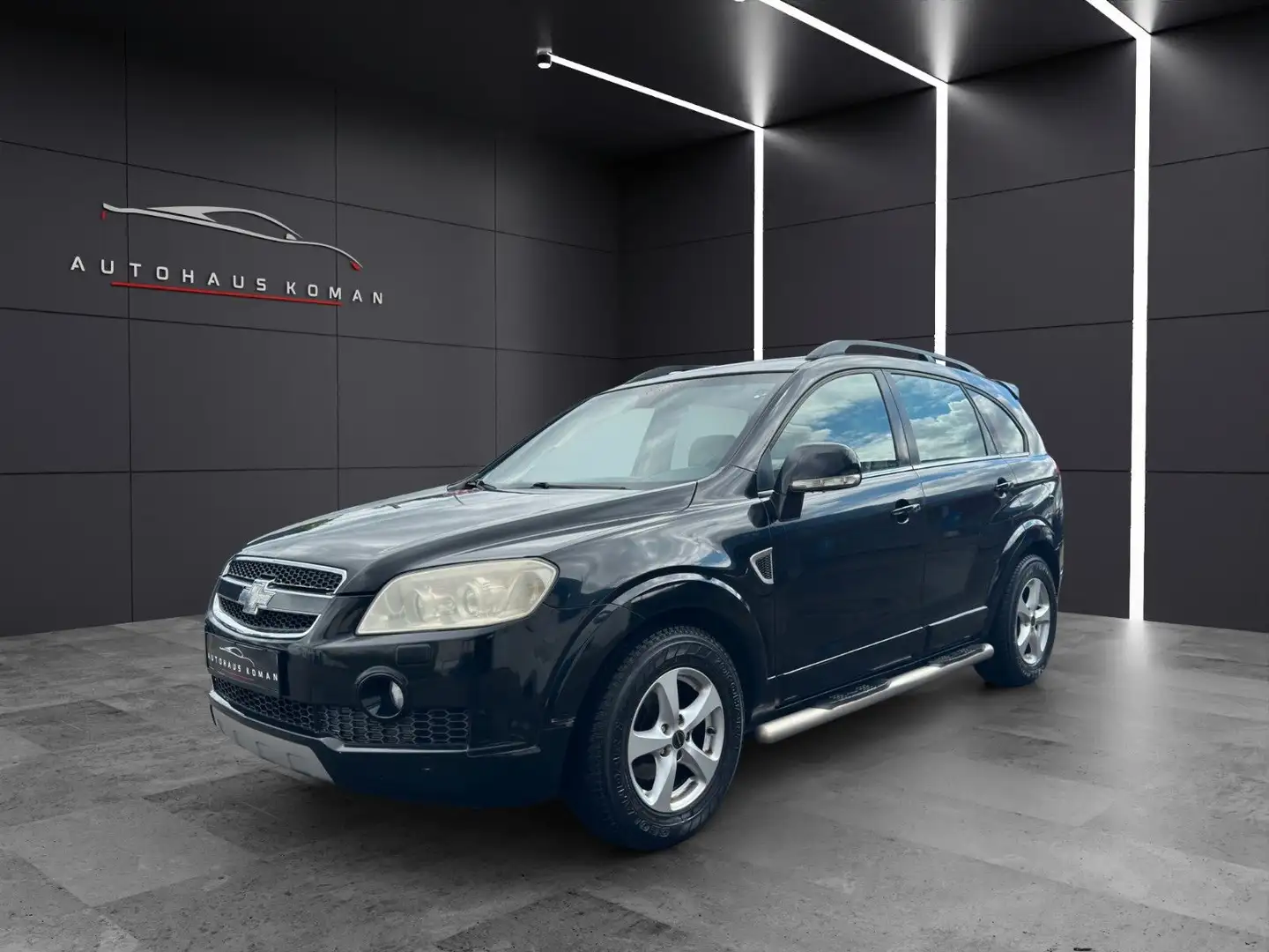 Chevrolet Captiva 3.2 4WD*PDC*AUTOM.*7-SITZ*LEDER*AHK*LPG Schwarz - 1