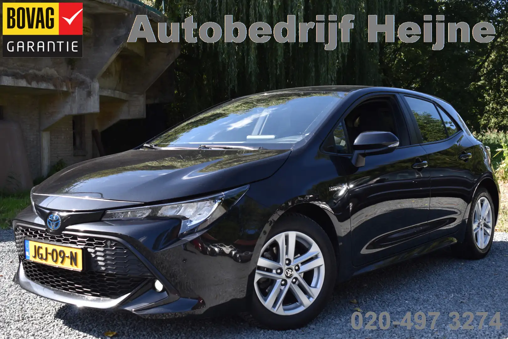 Toyota Corolla 1.8 HYBRID AUT. DYNAMIC NAVI/CAMERA/CARPLAY Zwart - 1