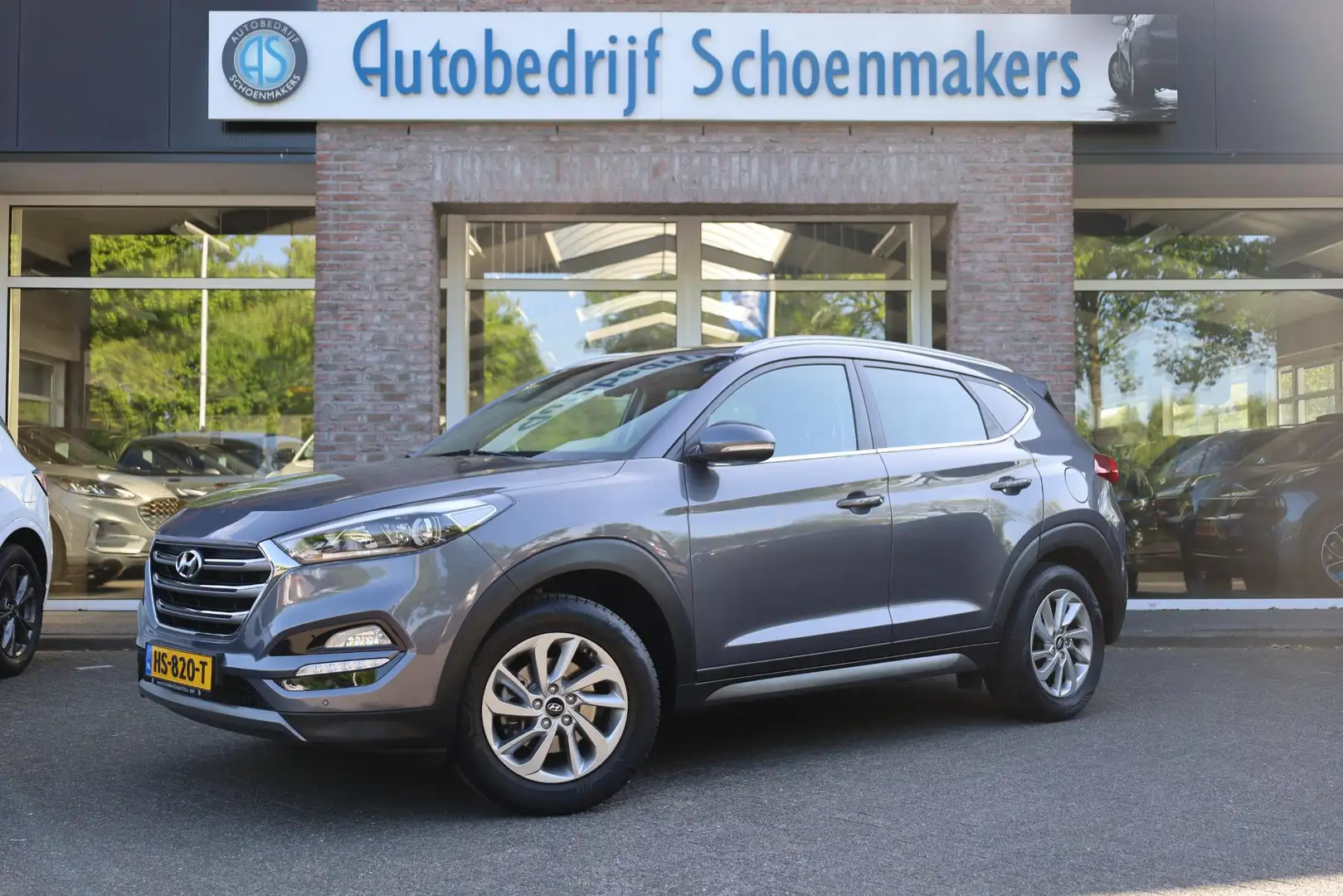 Hyundai TUCSON 1.6 GDi Comfort CAMERA TREKHAAK 4xSTOELVERWARMING Grijs - 1