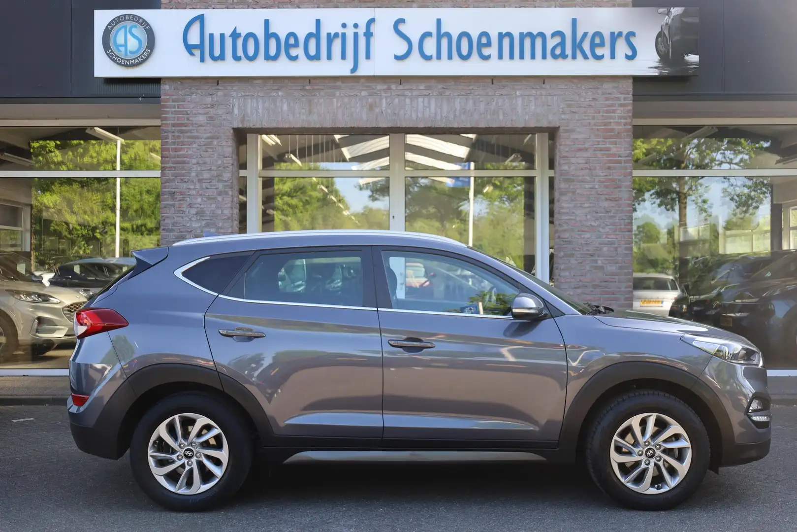 Hyundai TUCSON 1.6 GDi Comfort CAMERA TREKHAAK 4xSTOELVERWARMING Grijs - 2