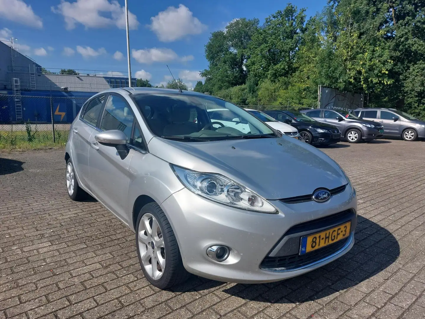 Ford Fiesta 1.25 Ghia 5 Deurs / Climate / Lm Velgen. Grigio - 2