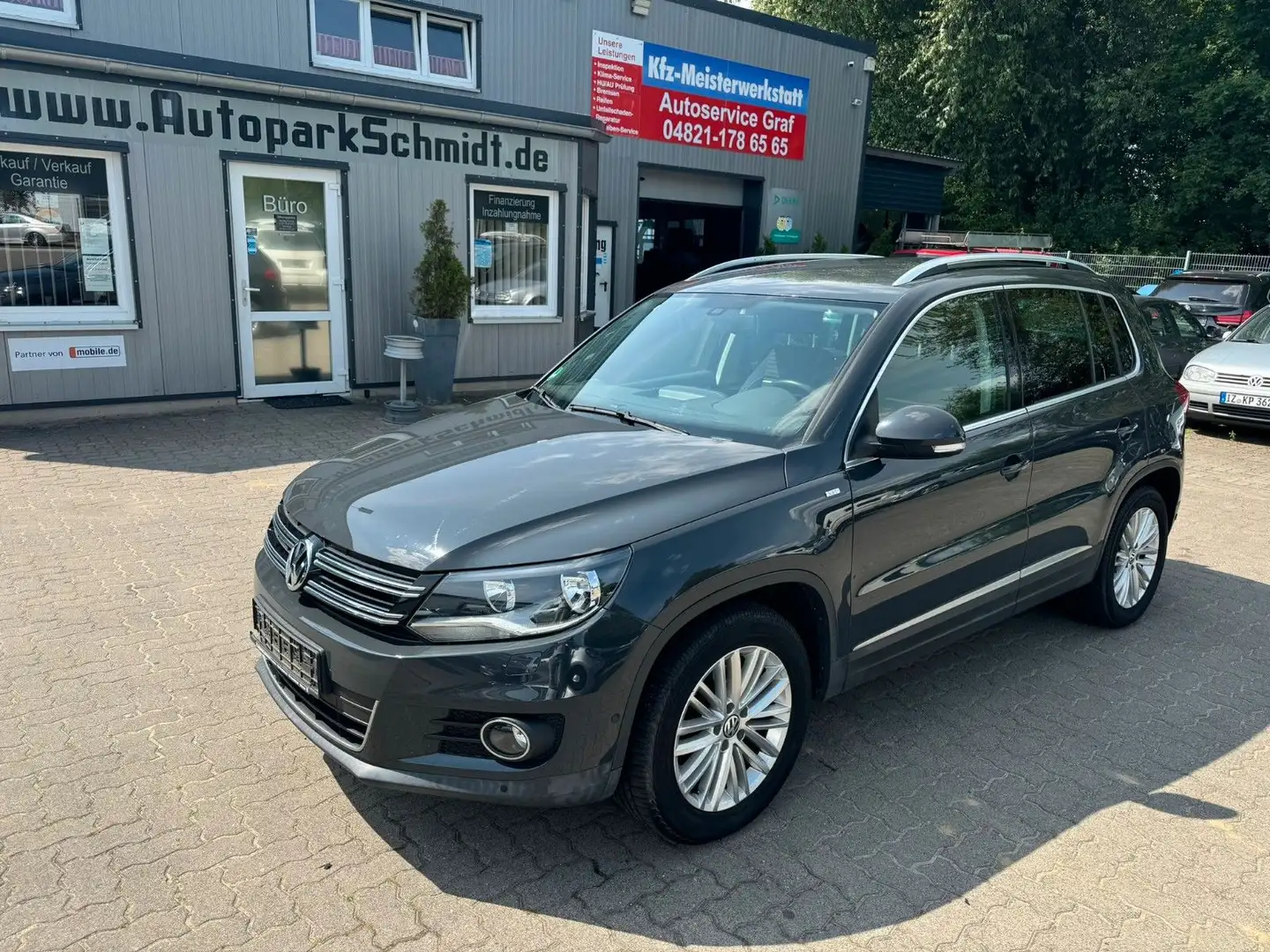 Volkswagen Tiguan AHK°PDC°TEMPOM°KLIMATR°SITZH°SCHECKHEFT! Grau - 1