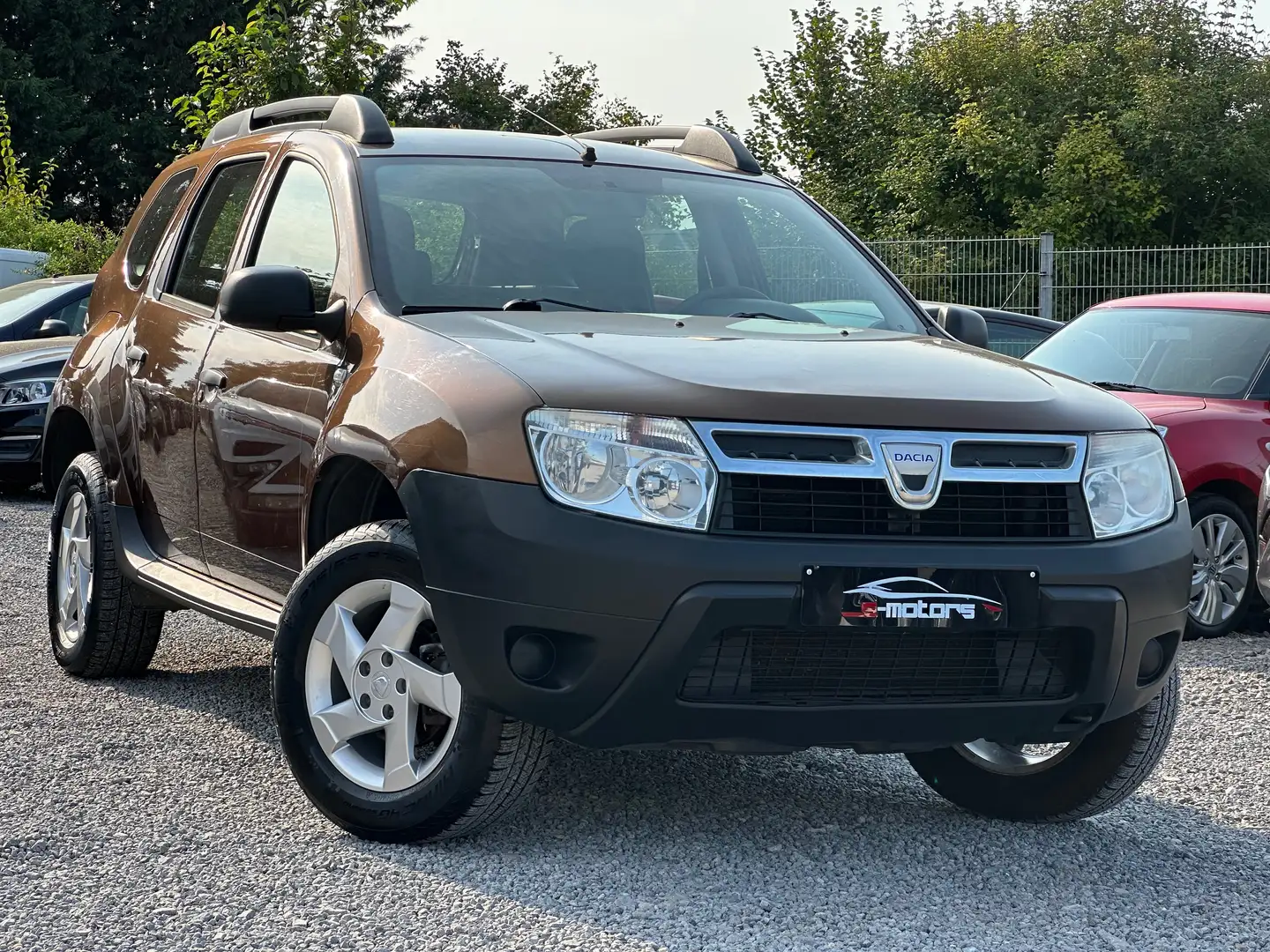 Dacia Duster •  1.6i • 4x2 • Brons - 1