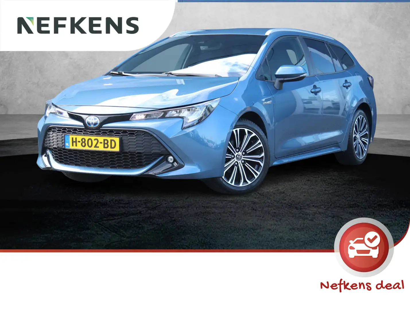 Toyota Corolla Touring SW Dynamic Hybrid 122 pk Automaat | Naviga Bleu - 1