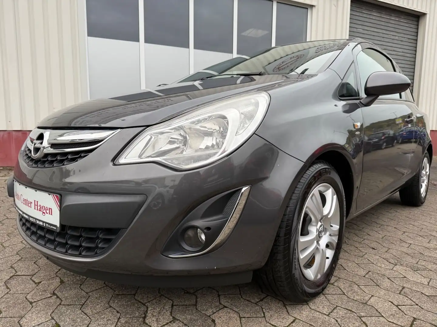 Opel Corsa D 1,2 51kW 69PS Satellite/Klima/1.Hand Gris - 1