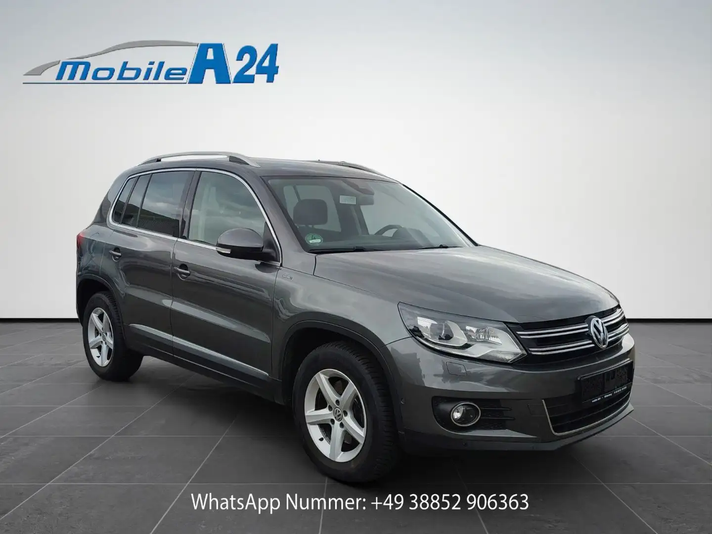 Volkswagen Tiguan Sport & Style NAVI AHK BIXENON 2.HAND Grau - 1