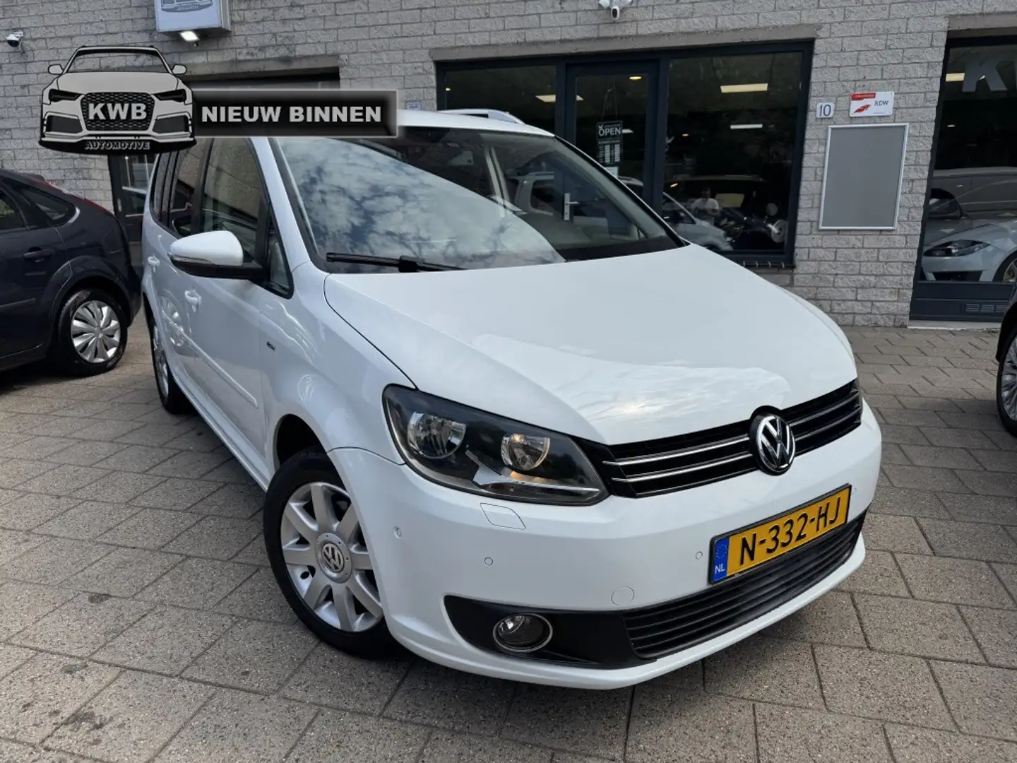 Volkswagen Touran 1.2 TSI Highl 7Pers Navi Dealer ODH Wit - 1