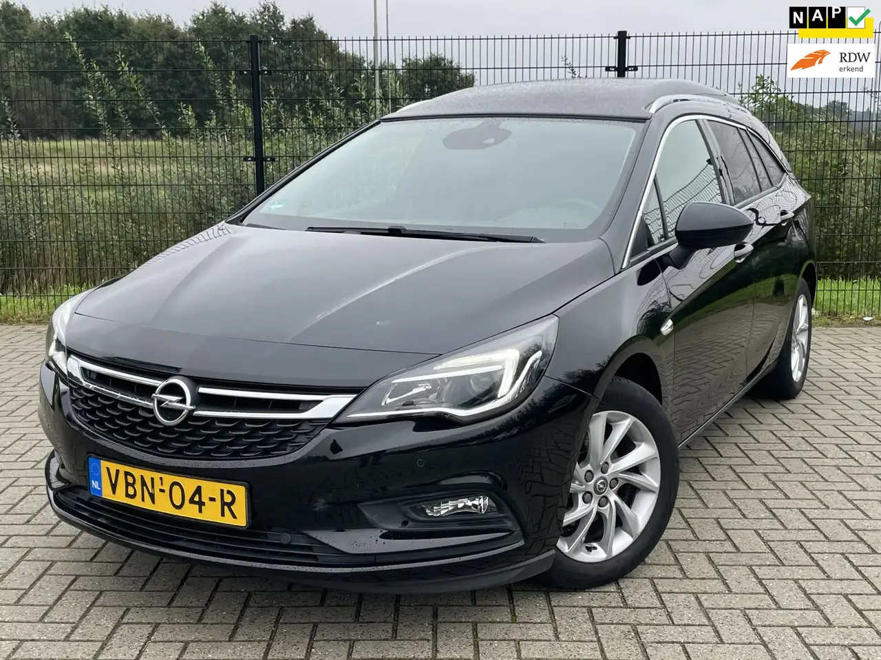 Opel Astra SPORTS TOURER+ | Grijs Kenteken | Carplay | PDC | — photo 1 of 25