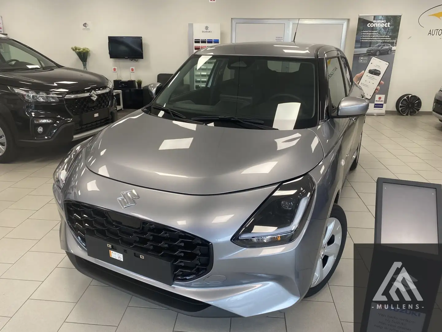 Suzuki Swift Grand Luxe + automaat garantie tot en met 04.2032 Gris - 1