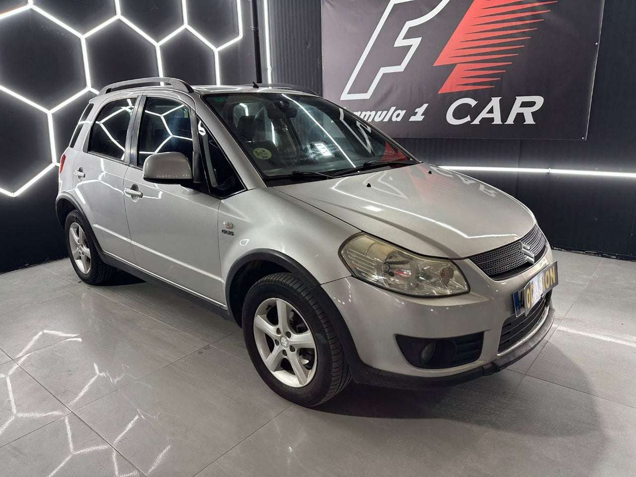 Suzuki SX4 1.9DDiS GL+ - foto 1