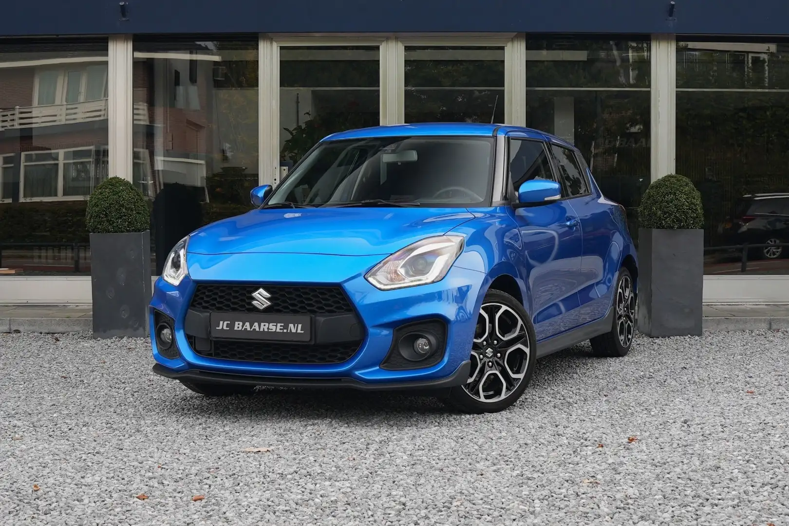 Suzuki Swift 1.4 Sport Smart Hybrid Blauw - 1