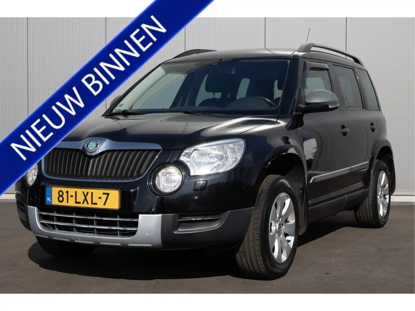 Skoda Yeti 1.2 TSI Active Plus airco cruise lmv trekhaak nl-a Zwart - 1