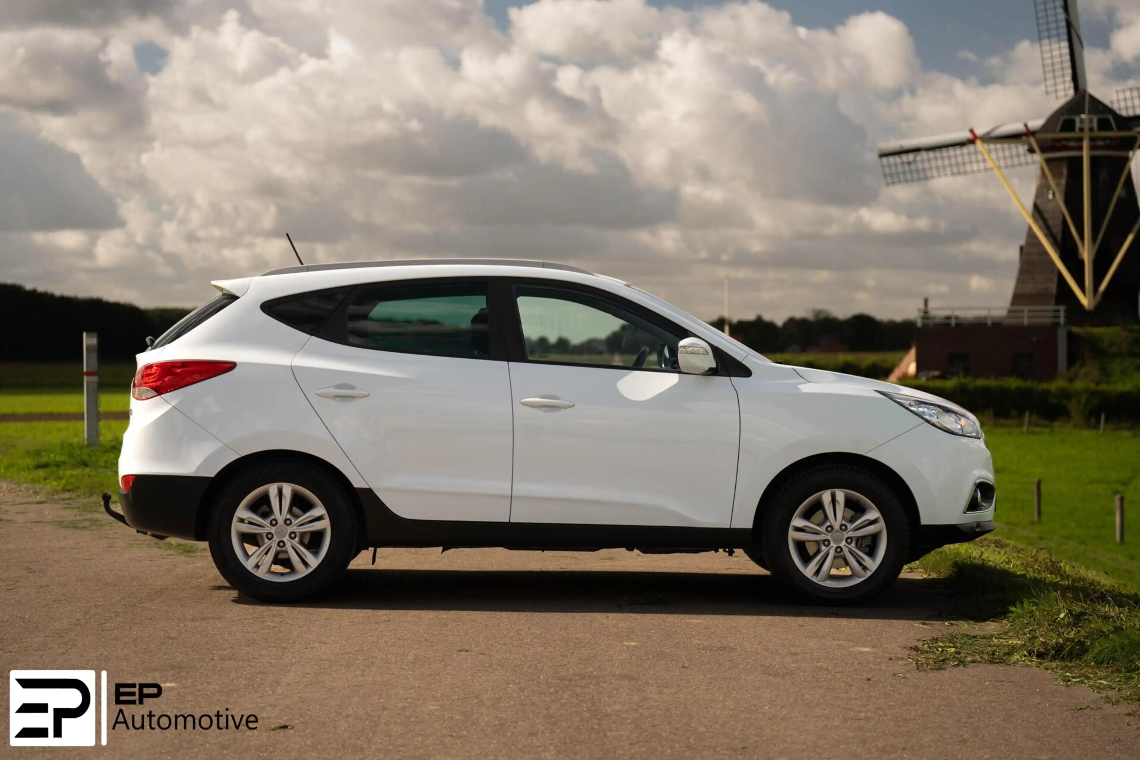 Hyundai iX35 2.0i|Trekhaak|Camera|CruiseControl|HalfLeder| — photo 22