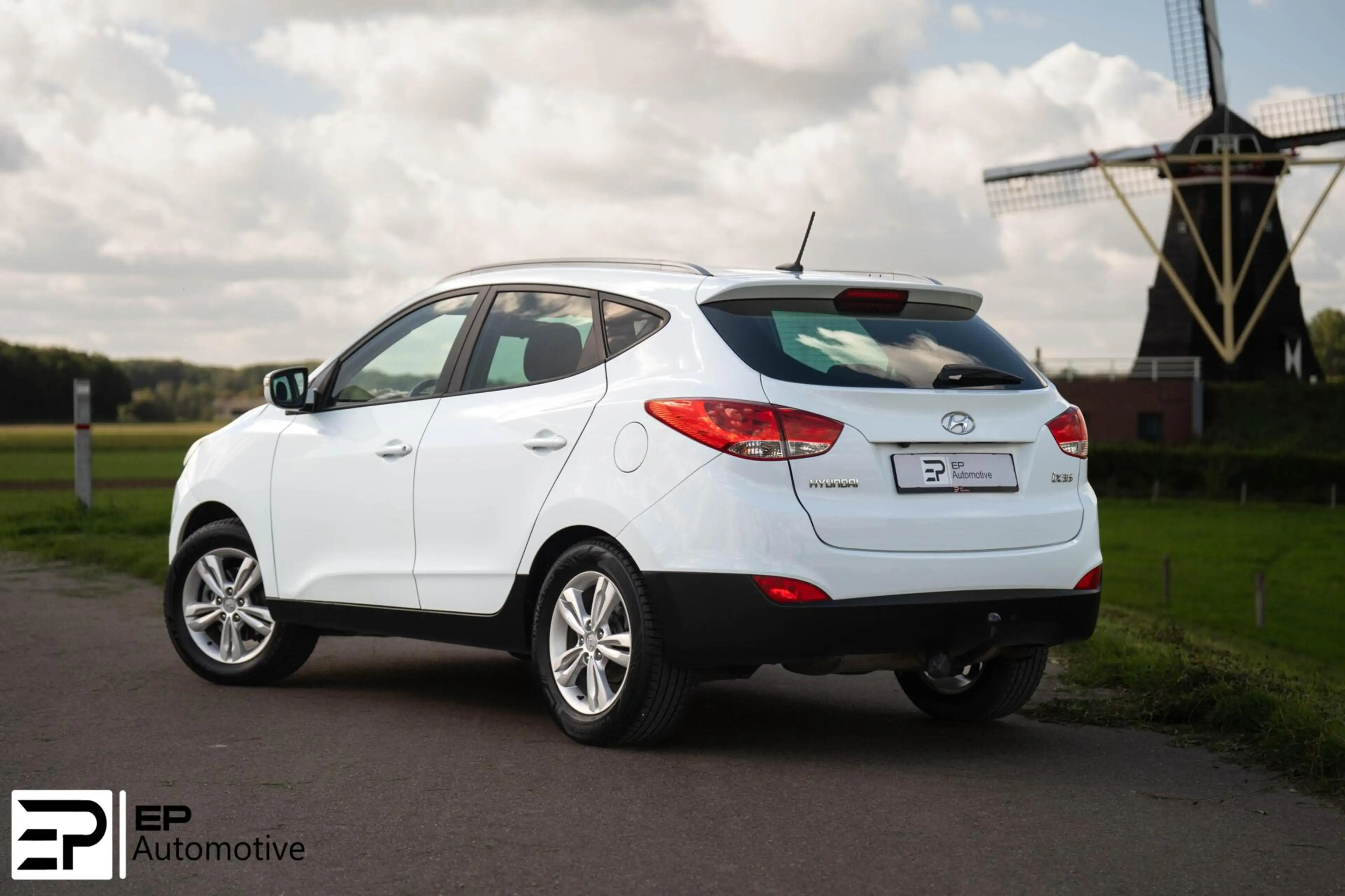 Hyundai iX35 2.0i|Trekhaak|Camera|CruiseControl|HalfLeder| — photo 17