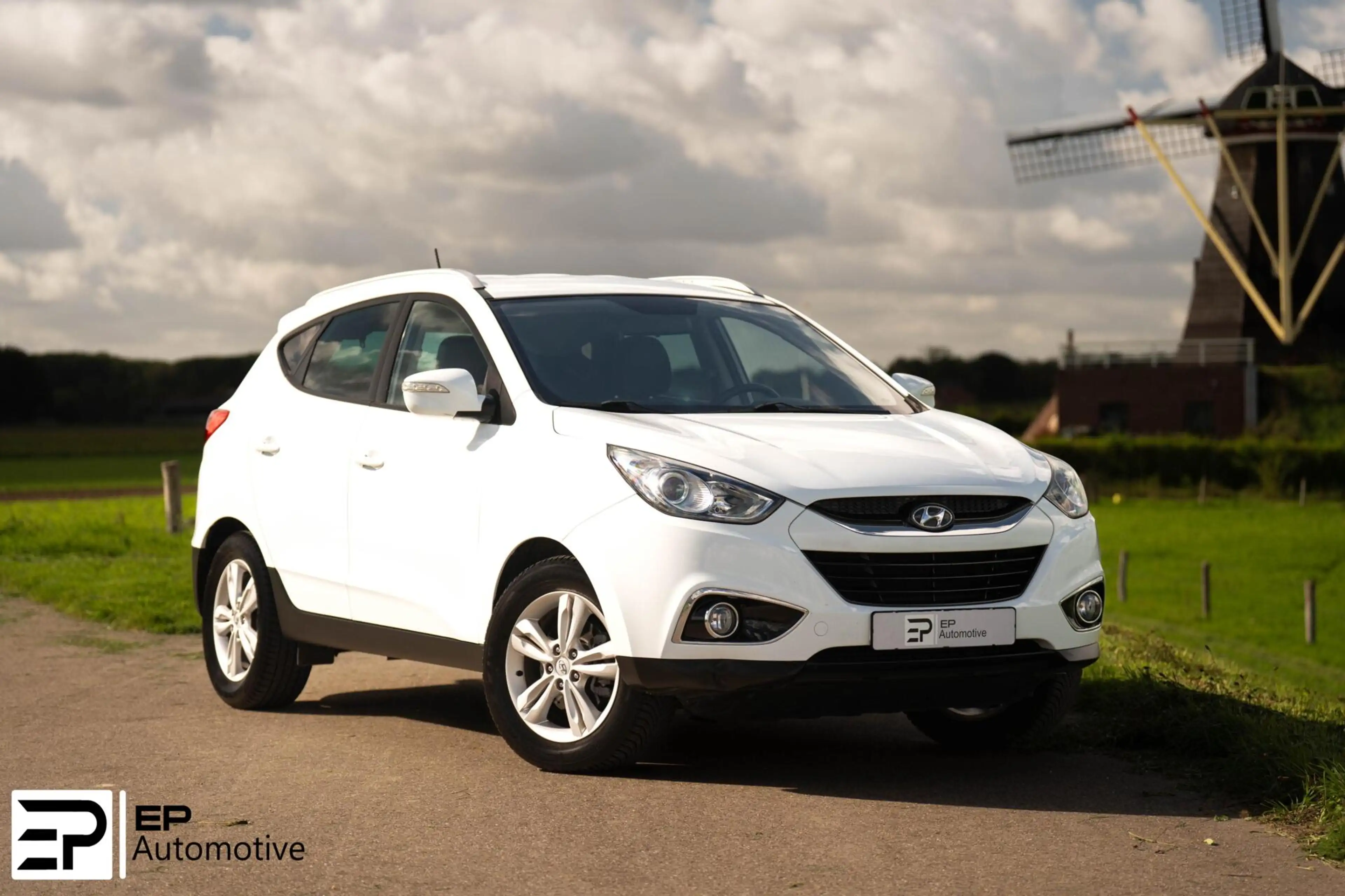 Hyundai iX35 2.0i|Trekhaak|Camera|CruiseControl|HalfLeder| — photo 26