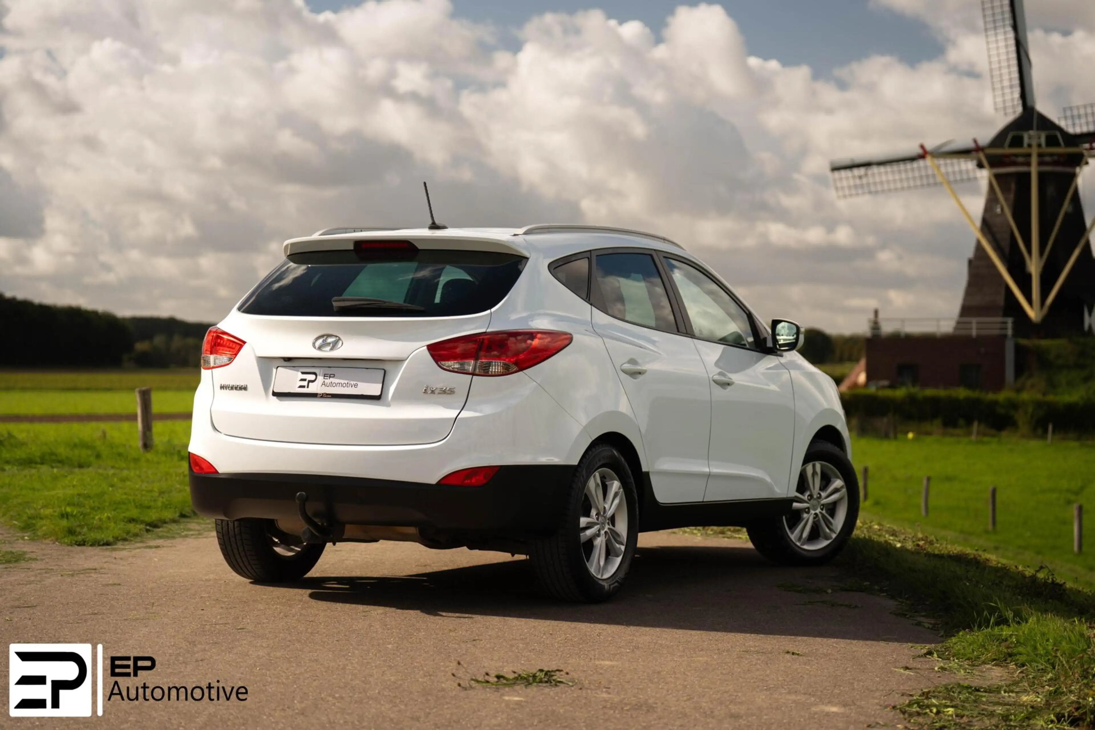 Hyundai iX35 2.0i|Trekhaak|Camera|CruiseControl|HalfLeder| — photo 21