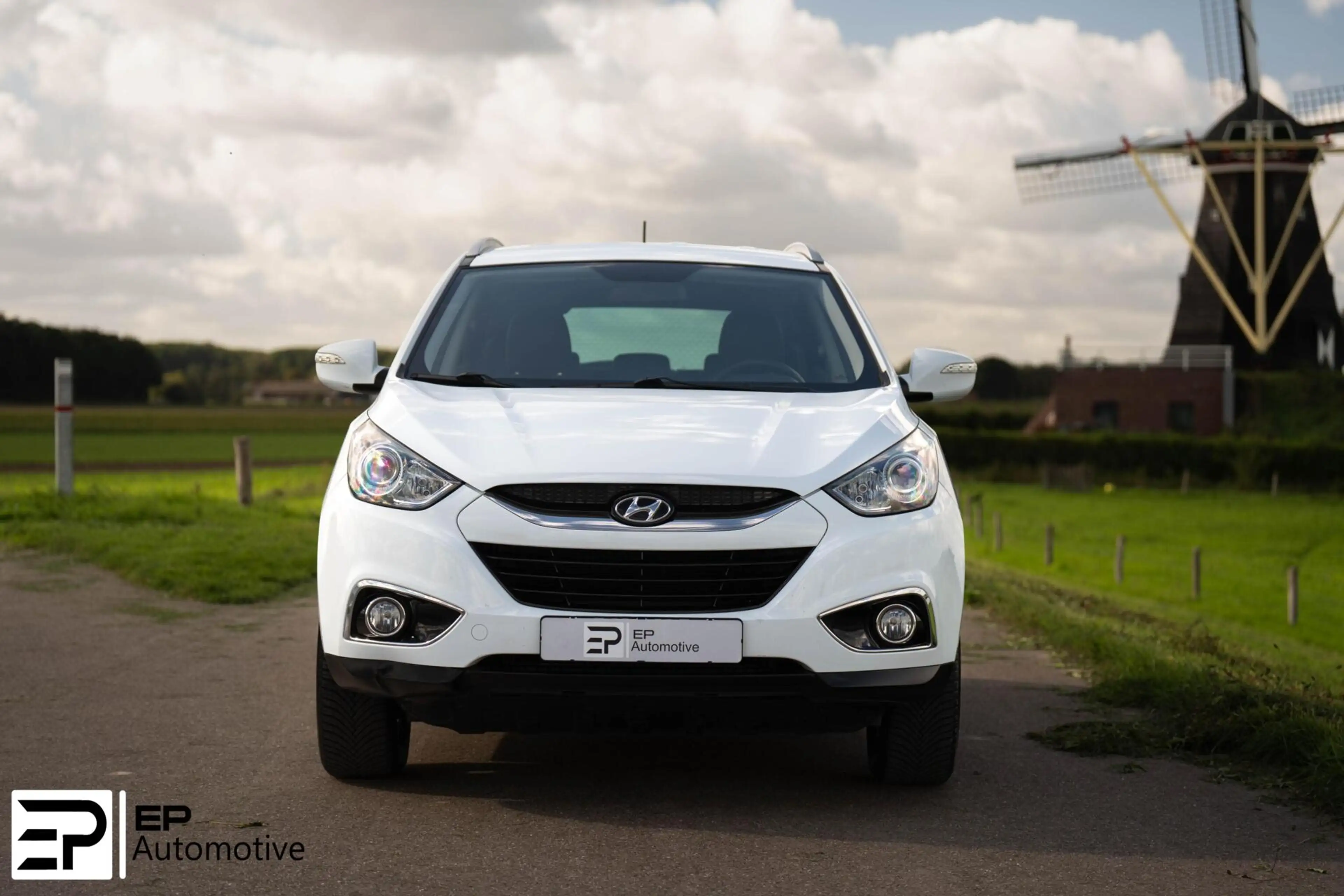 Hyundai iX35 2.0i|Trekhaak|Camera|CruiseControl|HalfLeder| — photo 27