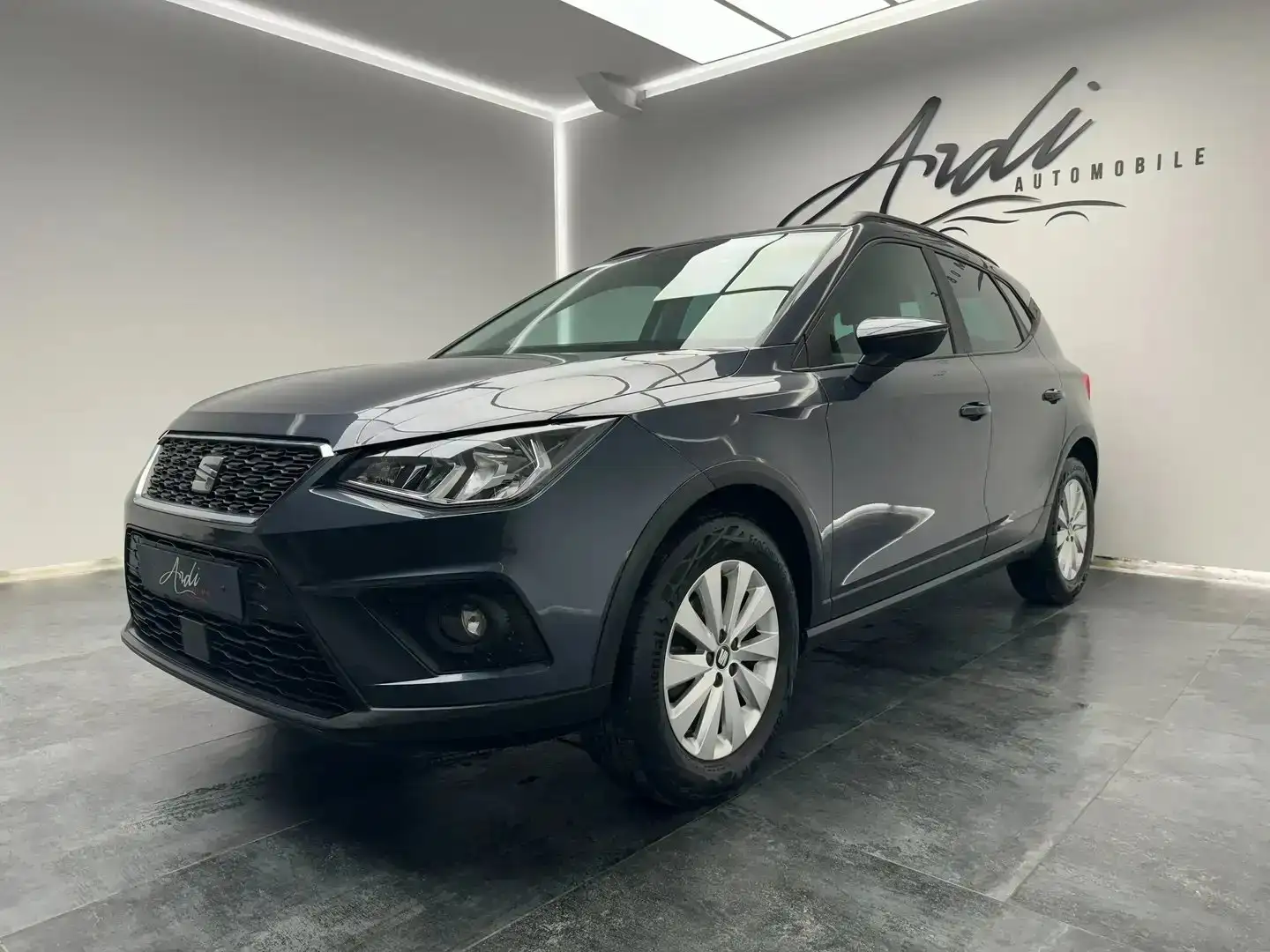 SEAT Arona 1.0 TSI *GARANTIE 12 MOIS*1er PROPRIETAIRE*GPS* Gris - 1
